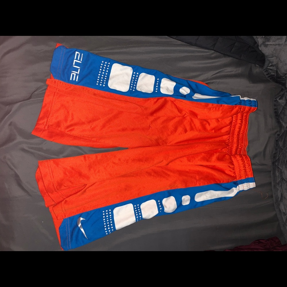 Orange Nike dri-fit shorts